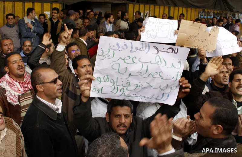 Egyptian protesters take part in a rally in front of the postal authority in Cairo, Egypt, Wedneday, Feb. 16, 2011. Photo by Ahmed Asad