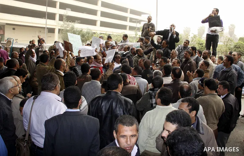 Egyptian protesters take part in a rally in front of the postal authority in Cairo, Egypt, Wedneday, Feb. 16, 2011. Photo by Ahmed Asad