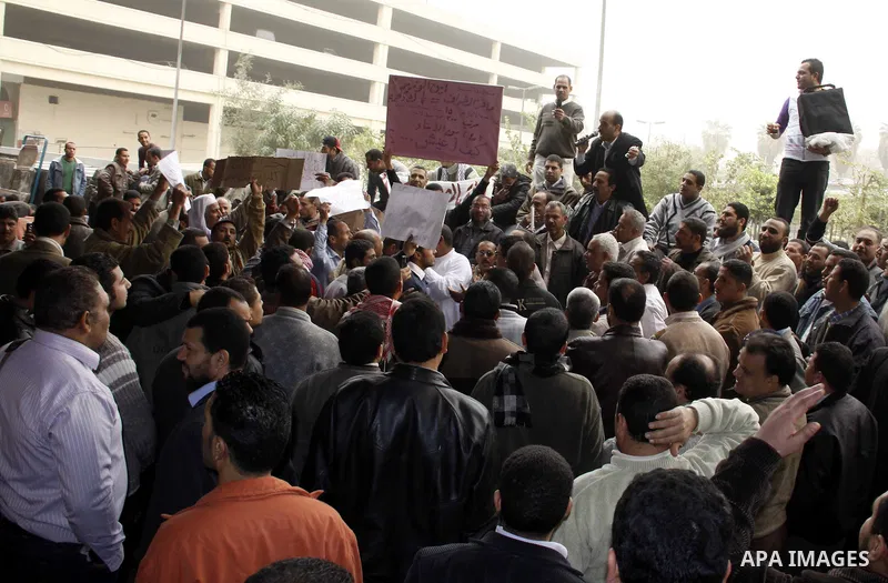 Egyptian protesters take part in a rally in front of the postal authority in Cairo, Egypt, Wedneday, Feb. 16, 2011. Photo by Ahmed Asad