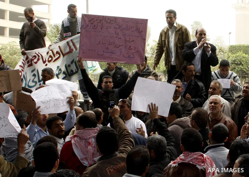 Egyptian protesters take part in a rally in front of the postal authority in Cairo, Egypt, Wedneday, Feb. 16, 2011. Photo by Ahmed Asad