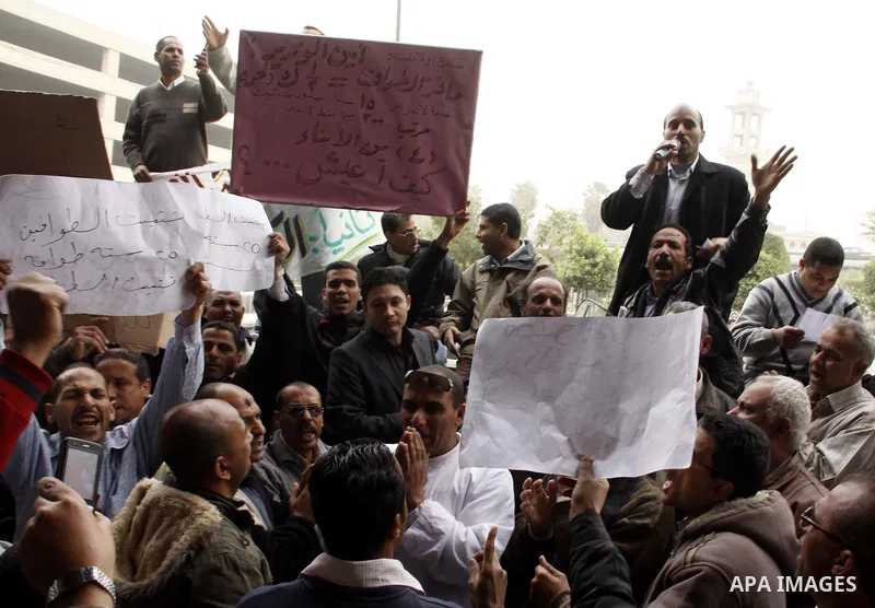 Egyptian protesters take part in a rally in front of the postal authority in Cairo, Egypt, Wedneday, Feb. 16, 2011. Photo by Ahmed Asad
