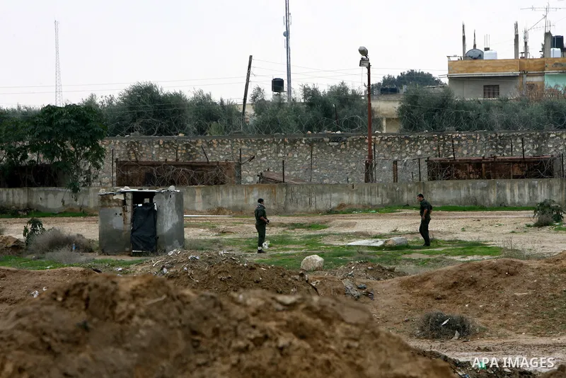 Palestinian security forces stand guard near the Egypt-Gaza border in Rafah, in the southern Gaza Strip on Feb. 16, 2011. Photo by Abed Rahim Khatib
