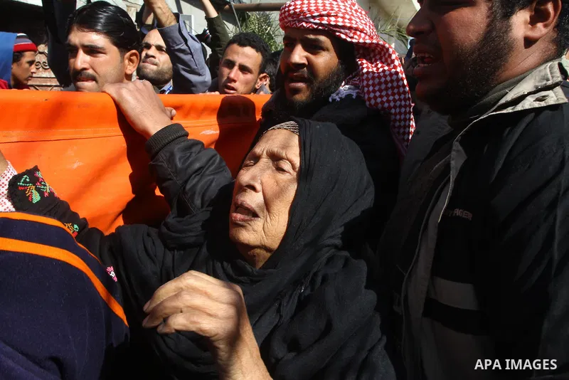 A relative of Jihad Khalaf, 20, one of the three Palestinians who were shot dead by Israeli forces, cries during his funeral in Beit Lahia, northern Gaza Strip, on February 17, 201. The three men were killed overnight by...