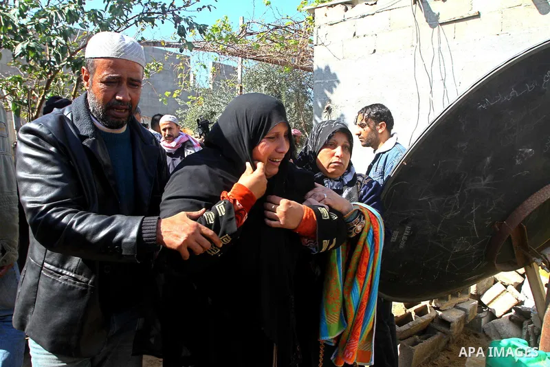 Palestinian relatives of Jihad Khalaf, one of the three Palestinians who were killed by Israeli fire, mourn during his funeral in Gaza City, on Feb. 17, 2011. Israel announced Thursday that the military killed three Pale...