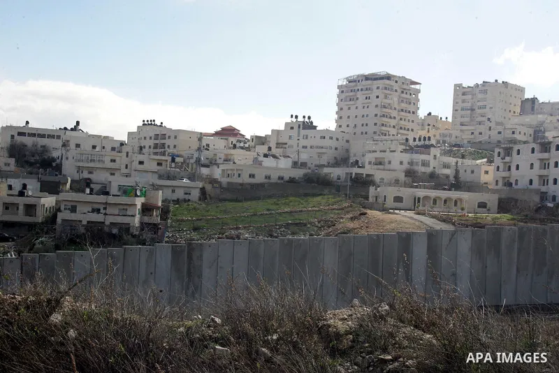 A view of the controversial Israeli separation barrier on the outskirts of Jerusalem on February 17,2011.. Photo by Mahfouz Abu Turk