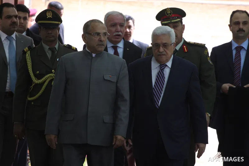 Palestinian President Mahmoud Abbas and East Timor President, Jose Ramos-Horta during the welcome ceremony, as Ramos-Horta arrive to the West Bank city of Ramallah on February 17, 2011. Photo by Issam Rimawi
