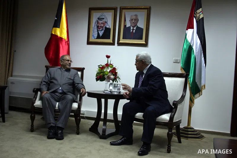 Palestinian president Mahmoud Abbas (L) meets with East Timor President, Jose Ramos-Horta (R) upon his arrival , in the West Bank city of Ramallah on February 17, 2011. Photo by Issam Rimawi