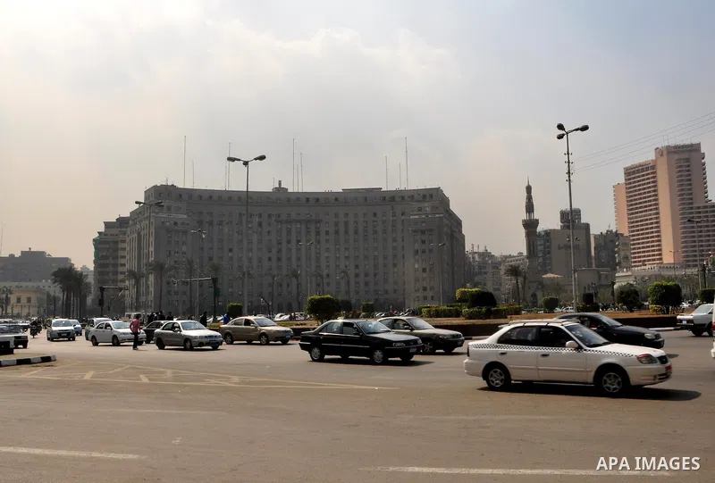 Egyptian people participate in their daily life in Cairo, Egypt on Feb. 17,2011. Mubarak's departure set off a chain reaction around the Middle East, with anti-government demonstrations reported Wednesday in Libya, Bahra...