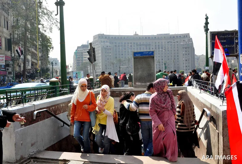 Egyptian people participate in their daily life in Cairo, Egypt on Feb. 17,2011. Mubarak's departure set off a chain reaction around the Middle East, with anti-government demonstrations reported Wednesday in Libya, Bahra...