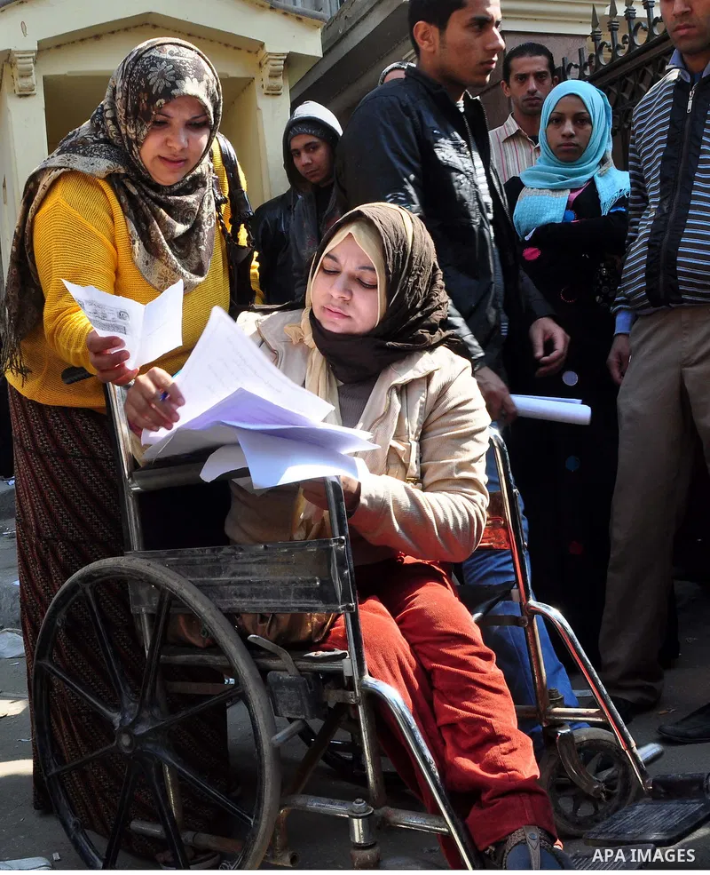 Egyptian people participate in their daily life in Cairo, Egypt on Feb. 17,2011. Mubarak's departure set off a chain reaction around the Middle East, with anti-government demonstrations reported Wednesday in Libya, Bahra...