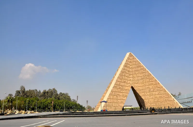Armored vehicles are seen in front of the memorial stone in Cairo, Egypt on Feb 17,2011. Mubarak's departure set off a chain reaction around the Middle East, with anti-government demonstrations reported Wednesday in Liby...