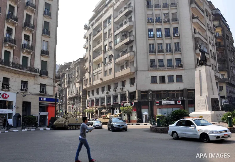 Egyptian people participate in their daily life in Cairo, Egypt on Feb. 17,2011. Mubarak's departure set off a chain reaction around the Middle East, with anti-government demonstrations reported Wednesday in Libya, Bahra...