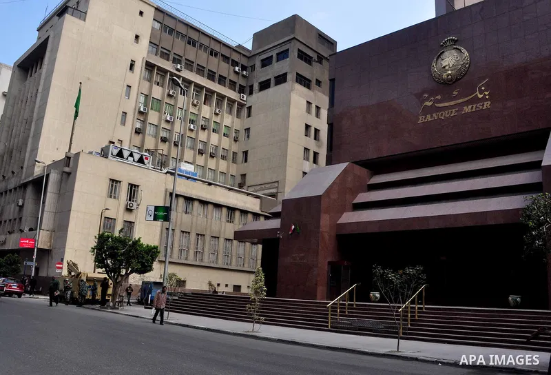 Armored vehicles are seen in front of an Egyptian bank in Cairo, Egypt on Feb 17,2011. Mubarak's departure set off a chain reaction around the Middle East, with anti-government demonstrations reported Wednesday in Libya,...