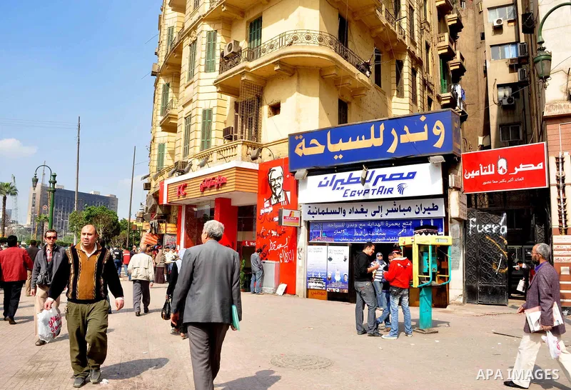 Egyptian people participate in their daily life in Cairo, Egypt on Feb. 17,2011. Mubarak's departure set off a chain reaction around the Middle East, with anti-government demonstrations reported Wednesday in Libya, Bahra...