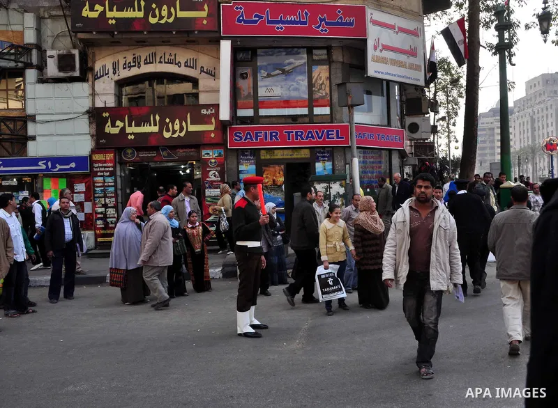 Egyptian people participate in their daily life in Cairo, Egypt on Feb. 17,2011. Mubarak's departure set off a chain reaction around the Middle East, with anti-government demonstrations reported Wednesday in Libya, Bahra...