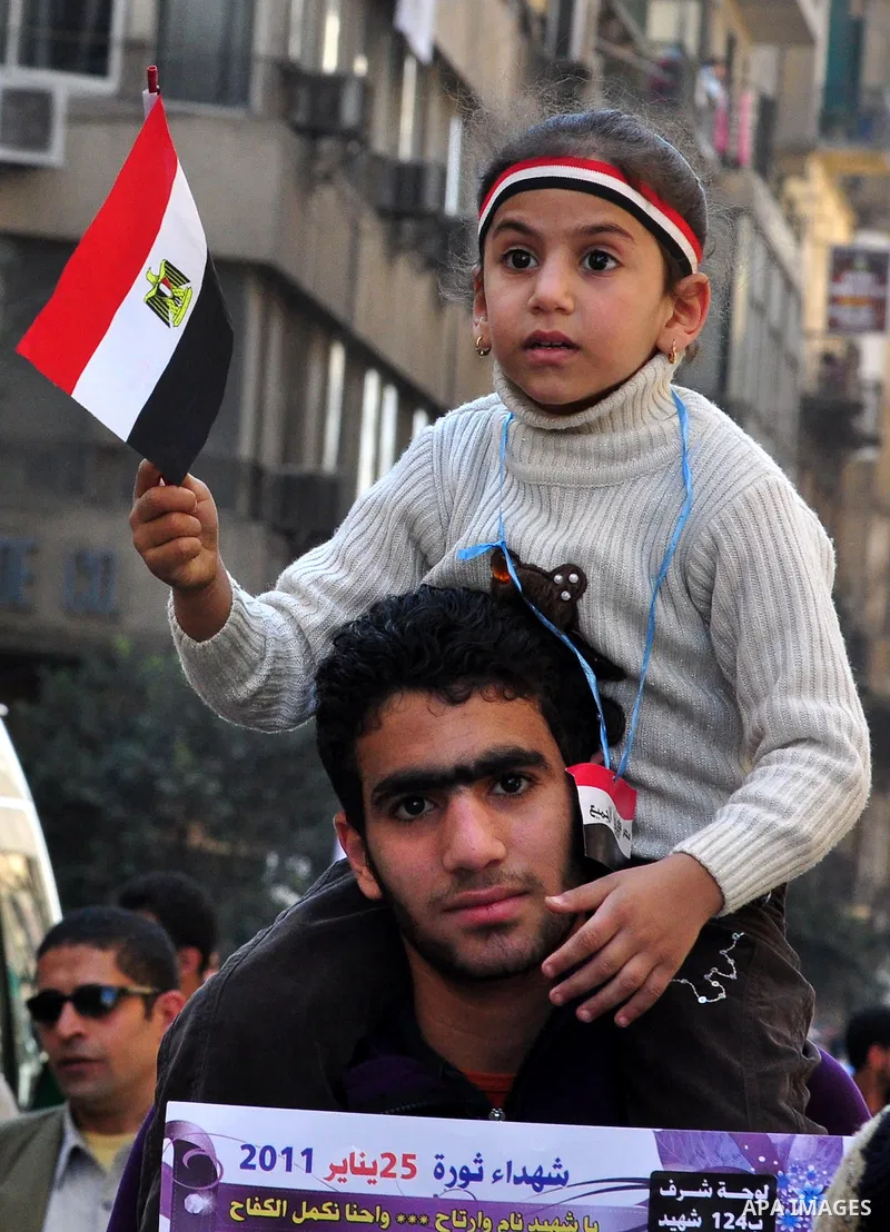 An Egyptian man attends a march at Tahrir Square in Cairo, Egypt, Feb. 18, 2011. Tens of thousands of flag-waving Egyptians packed into Tahrir Square for a day of prayer and celebration Friday to mark the fall of Hosni M...