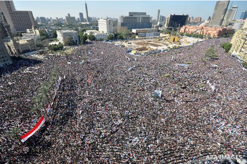 Thousands attend Friday prayers and a demonstration in Tahrir Square in Cairo, Egypt, Friday Feb. 18, 2011. Tens of thousands of flag-waving Egyptians packed into Tahrir Square for a day of prayer and celebration Friday...