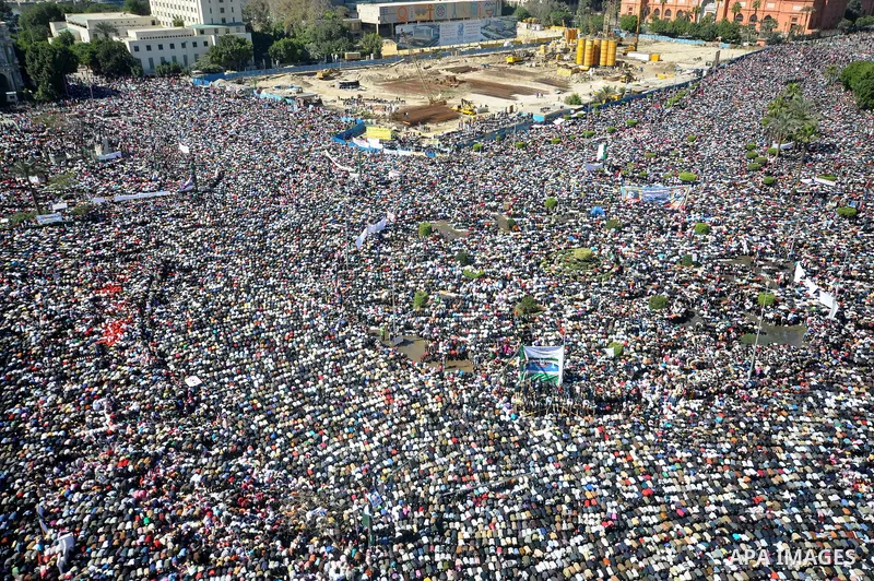 Thousands attend Friday prayers and a demonstration in Tahrir Square in Cairo, Egypt, Friday Feb. 18, 2011. Tens of thousands of flag-waving Egyptians packed into Tahrir Square for a day of prayer and celebration Friday...