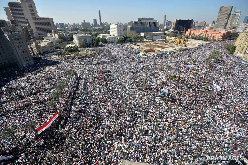 Thousands attend Friday prayers and a demonstration in Tahrir Square in Cairo, Egypt, Friday Feb. 18, 2011. Tens of thousands of flag-waving Egyptians packed into Tahrir Square for a day of prayer and celebration Friday...
