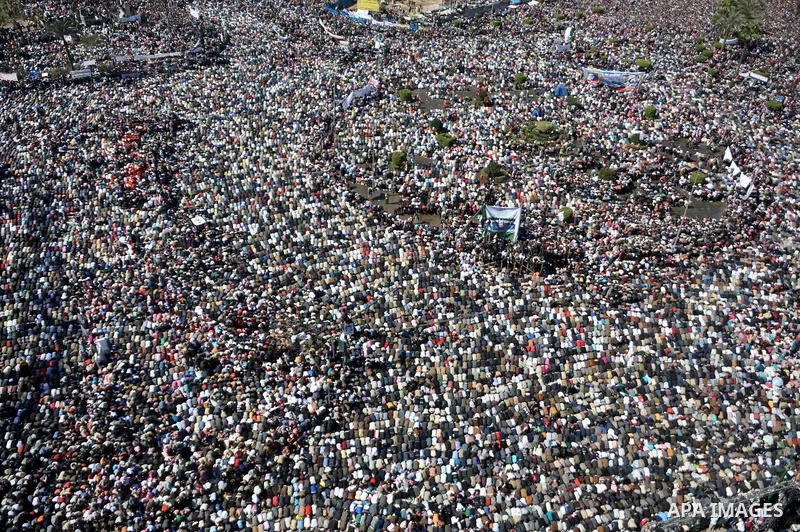 Thousands attend Friday prayers and a demonstration in Tahrir Square in Cairo, Egypt, Friday Feb. 18, 2011. Tens of thousands of flag-waving Egyptians packed into Tahrir Square for a day of prayer and celebration Friday...