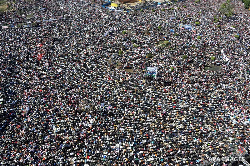 Thousands attend Friday prayers and a demonstration in Tahrir Square in Cairo, Egypt, Friday Feb. 18, 2011. Tens of thousands of flag-waving Egyptians packed into Tahrir Square for a day of prayer and celebration Friday...