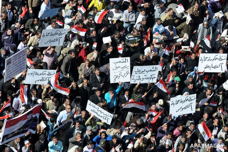 Thousands attend Friday prayers and a demonstration in Tahrir Square in Cairo, Egypt, Friday Feb. 18, 2011. Tens of thousands of flag-waving Egyptians packed into Tahrir Square for a day of prayer and celebration Friday...