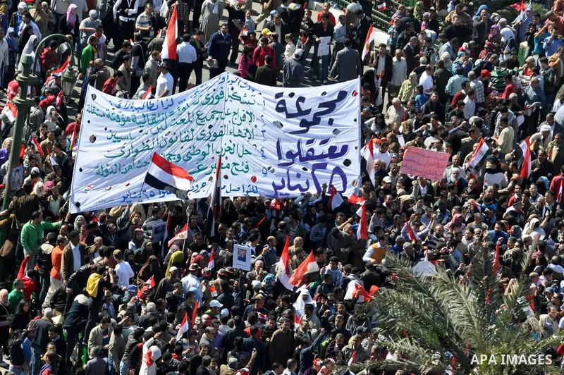 Thousands attend Friday prayers and a demonstration in Tahrir Square in Cairo, Egypt, Friday Feb. 18, 2011. Tens of thousands of flag-waving Egyptians packed into Tahrir Square for a day of prayer and celebration Friday...