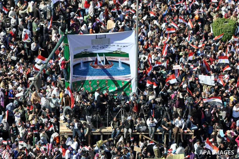 Thousands attend Friday prayers and a demonstration in Tahrir Square in Cairo, Egypt, Friday Feb. 18, 2011. Tens of thousands of flag-waving Egyptians packed into Tahrir Square for a day of prayer and celebration Friday...