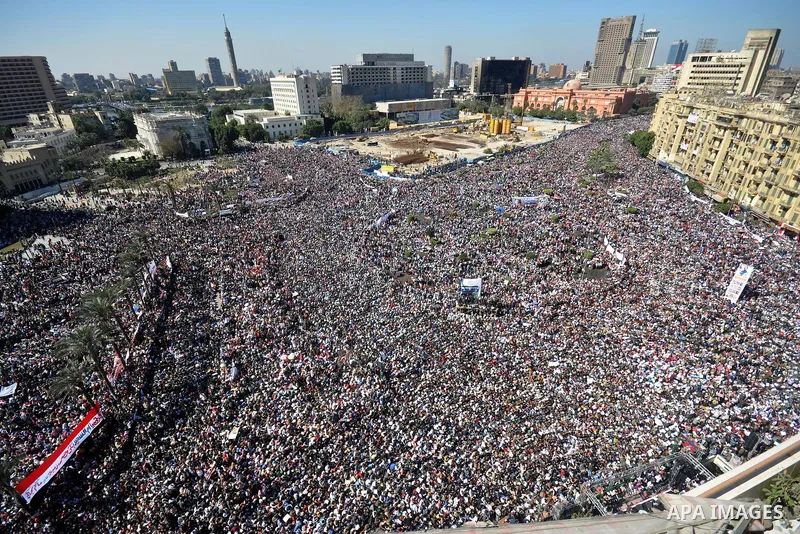 Thousands attend Friday prayers and a demonstration in Tahrir Square in Cairo, Egypt, Friday Feb. 18, 2011. Tens of thousands of flag-waving Egyptians packed into Tahrir Square for a day of prayer and celebration Friday...