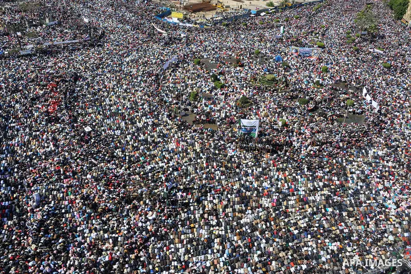 Thousands attend Friday prayers and a demonstration in Tahrir Square in Cairo, Egypt, Friday Feb. 18, 2011. Tens of thousands of flag-waving Egyptians packed into Tahrir Square for a day of prayer and celebration Friday...