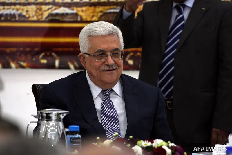 Palestinian President Mahmud Abbas meets Palestinian Authority officials in the West Bank city of Ramallah on February 18, 2011. Abbas defied US attempts to get him to abandon a UN Security Council vote against Israeli s...