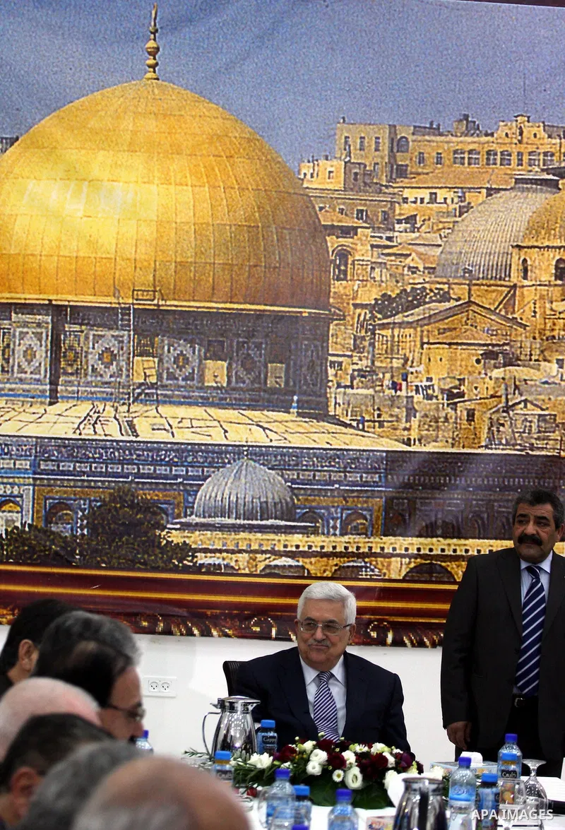 Palestinian President Mahmud Abbas meets Palestinian Authority officials in the West Bank city of Ramallah on February 18, 2011. Abbas defied US attempts to get him to abandon a UN Security Council vote against Israeli s...