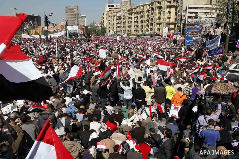 Thousands attend Friday prayers and a demonstration in Tahrir Square in Cairo, Egypt, Friday Feb. 18, 2011. Tens of thousands of flag-waving Egyptians packed into Tahrir Square for a day of prayer and celebration Friday...
