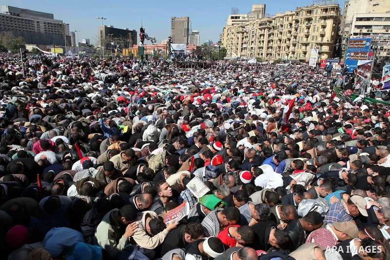Thousands attend Friday prayers and a demonstration in Tahrir Square in Cairo, Egypt, Friday Feb. 18, 2011. Tens of thousands of flag-waving Egyptians packed into Tahrir Square for a day of prayer and celebration Friday...