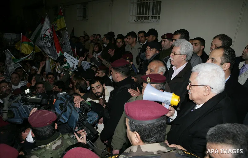Palestinian President Mahmud Abbas during a march to show support and pro-security council decision against Israeli settlements, in the West Bank city of Ramallah on Feb. 18,2011. Photo by Thaer Ganaim