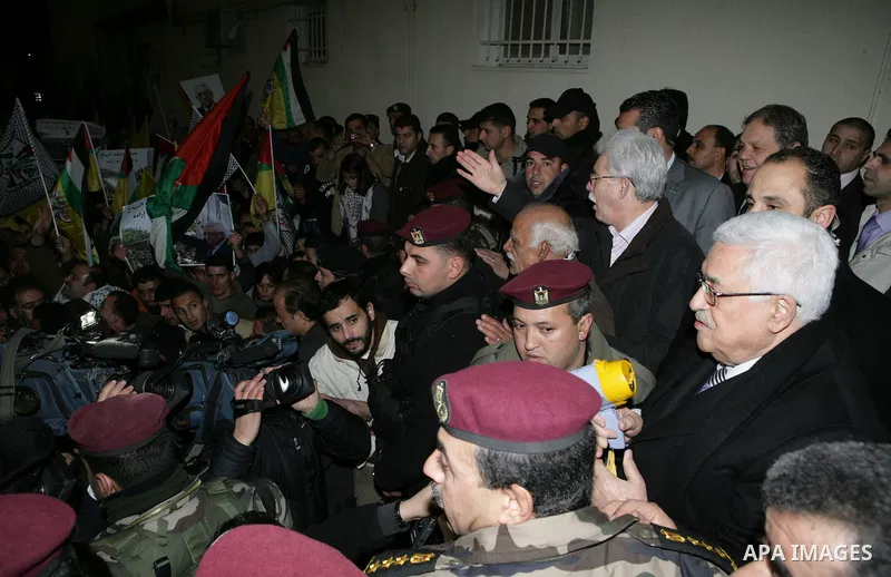 Palestinian President Mahmud Abbas during a march to show support and pro-security council decision against Israeli settlements, in the West Bank city of Ramallah on Feb. 18,2011. Photo by Thaer Ganaim