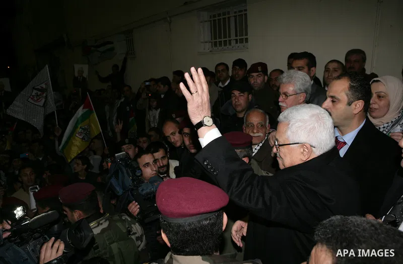 Palestinian President Mahmud Abbas during a march to show support and pro-security council decision against Israeli settlements, in the West Bank city of Ramallah on Feb. 18,2011. Photo by Thaer Ganaim