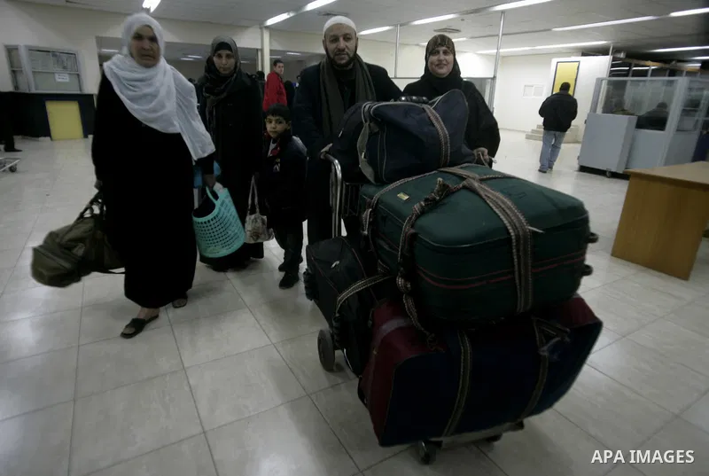 Palestinians Leaving the Hall travelers after coming back from Egypt at the Rafah border crossing between southern Gaza Strip and Egypt, Friday, Feb. 18, 2011. The Rafah border crossing opened on Friday evening for the f...