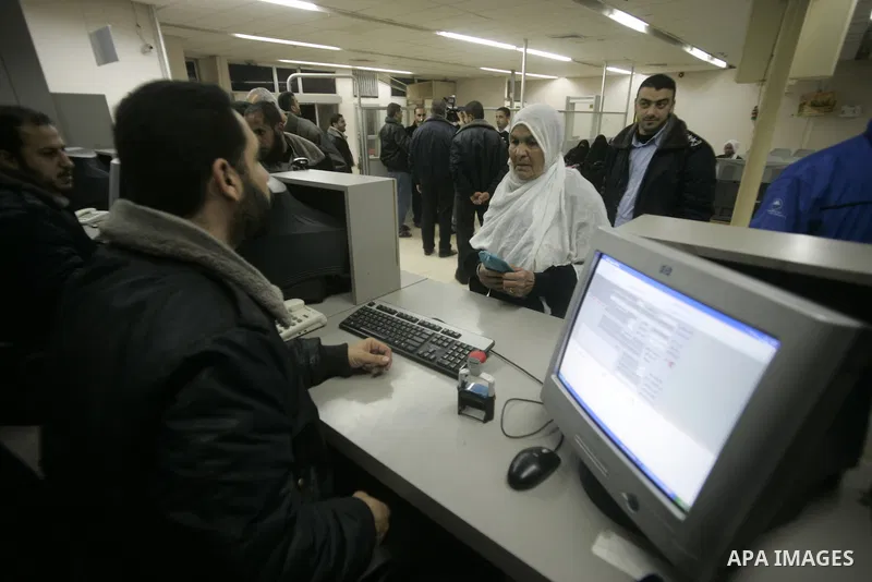 Palestinians Leaving the Hall travelers after coming back from Egypt at the Rafah border crossing between southern Gaza Strip and Egypt, Friday, Feb. 18, 2011. The Rafah border crossing opened on Friday evening for the f...