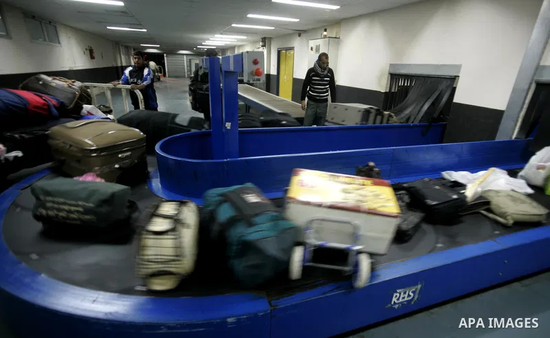 Palestinians Leaving the Hall travelers after coming back from Egypt at the Rafah border crossing between southern Gaza Strip and Egypt, Friday, Feb. 18, 2011. The Rafah border crossing opened on Friday evening for the f...