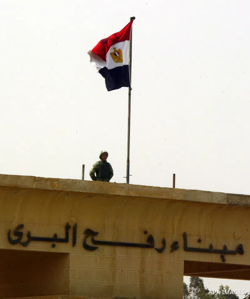 Egyptian soldiers stand guard at the Rafah crossing on Feb. 19, 2011. The Egyptian authorities reopened the Rafah crossing on its border with the Gaza Stripe on Friday, the first time after the resignation of President H...