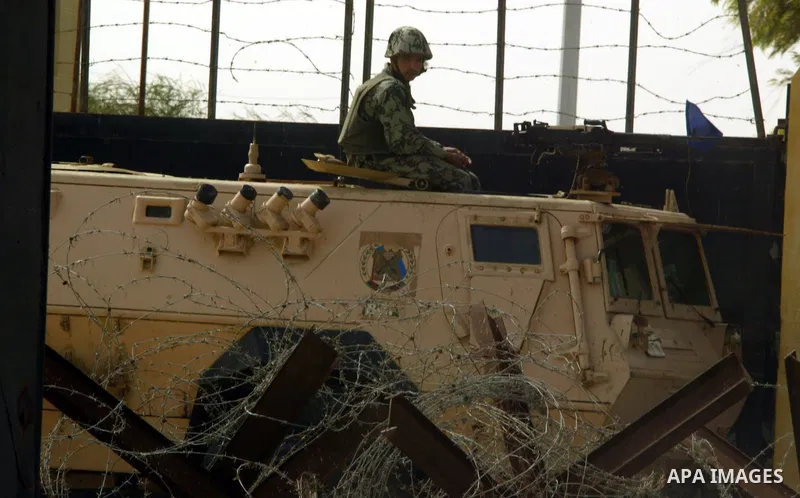 Egyptian soldiers stand guard at the Rafah crossing on Feb. 19, 2011. The Egyptian authorities reopened the Rafah crossing on its border with the Gaza Stripe on Friday, the first time after the resignation of President H...