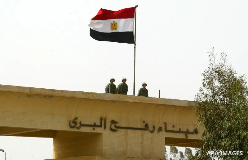 Egyptian soldiers stand guard at the Rafah crossing on Feb. 19, 2011. The Egyptian authorities reopened the Rafah crossing on its border with the Gaza Stripe on Friday, the first time after the resignation of President H...