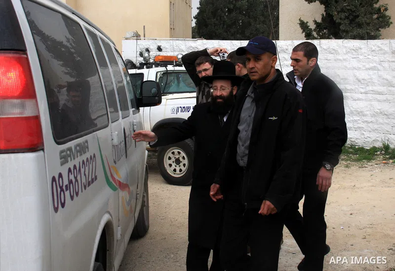 An Israeli Jewish rabbi walks at the entrance of the tomb of the Biblical figure Yehoshua Bin Nun, also know as Joshua, in the West Bank village of Kifl Hareth, near Nablus, Sunday, Feb 20,2011. Photo by Wagdi Eshtayah