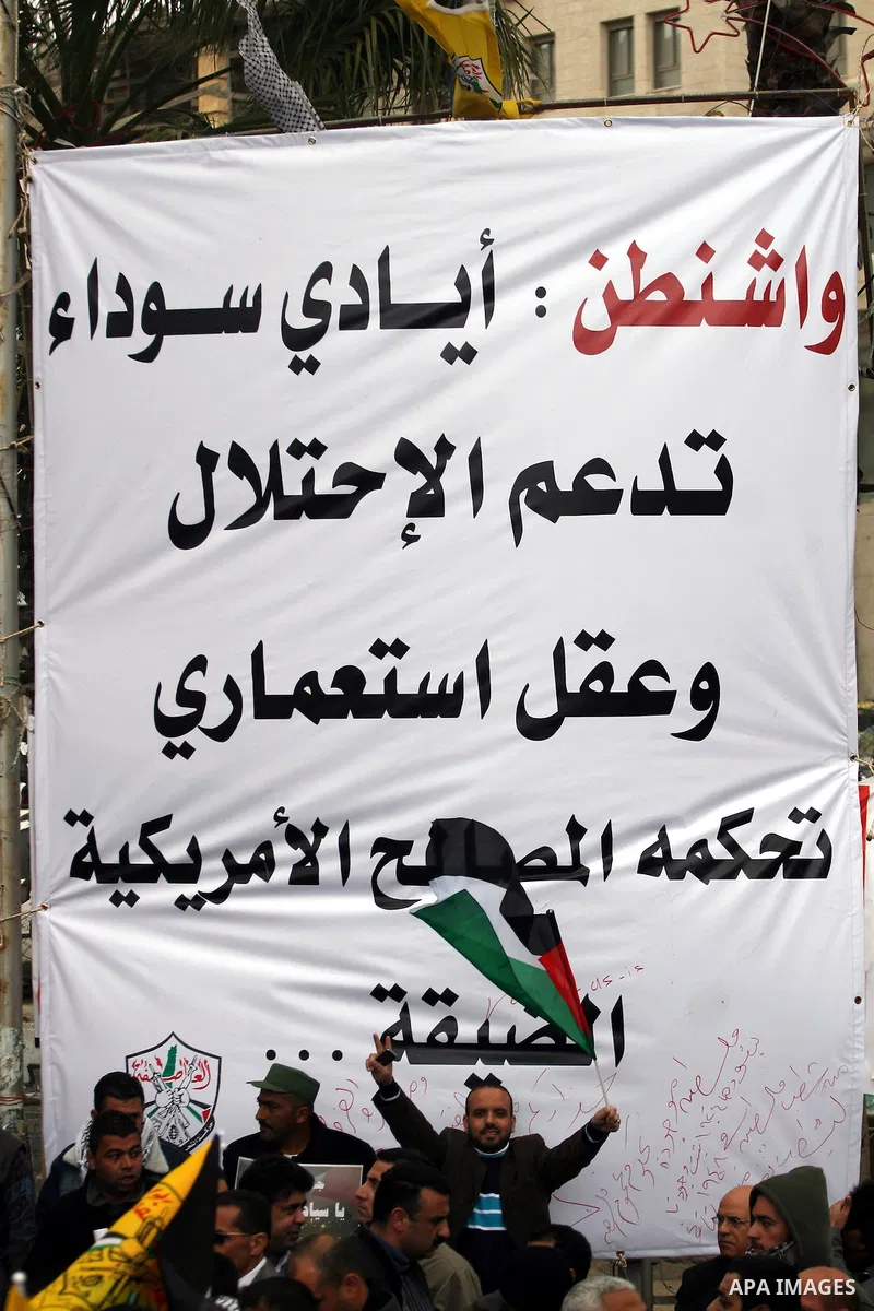 Palestinians demonstrate against the U.S. for vetoing the Arab-backed Security Council resolution against Jewish settlements, in the West Bank city of Ramallah, Sunday, Feb. 20, 2011. Palestinians with backing from much...