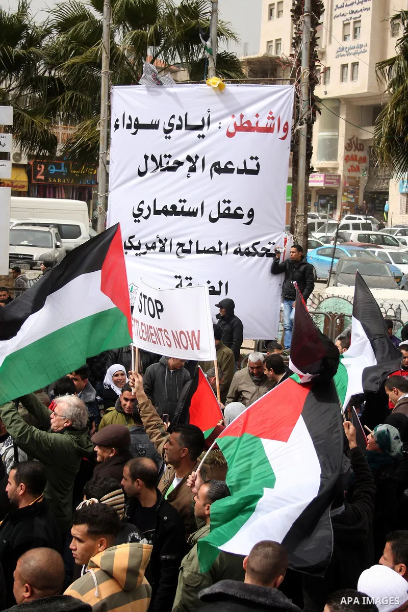 Palestinians demonstrate against the U.S. for vetoing the Arab-backed Security Council resolution against Jewish settlements, in the West Bank city of Ramallah, Sunday, Feb. 20, 2011. Palestinians with backing from much...