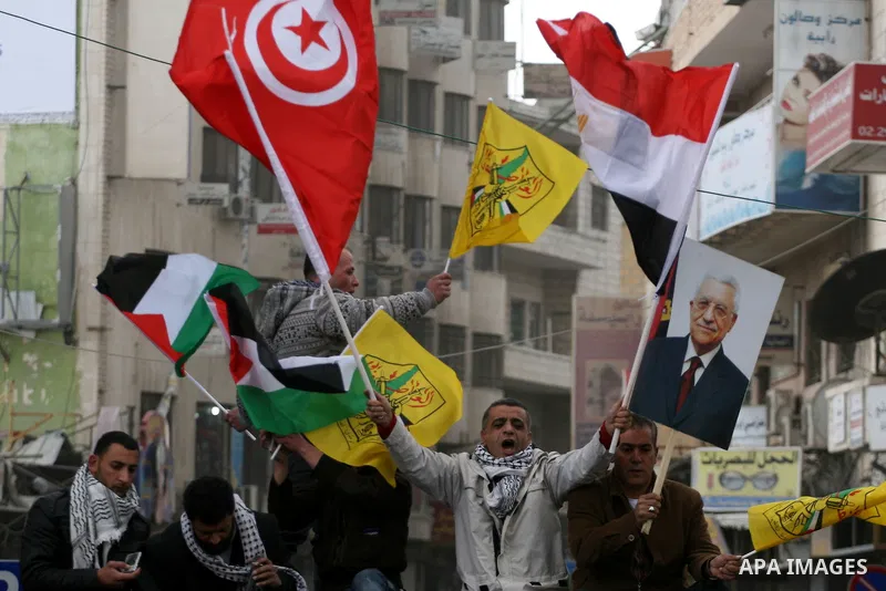 Palestinians demonstrate against the U.S. for vetoing the Arab-backed Security Council resolution against Jewish settlements, in the West Bank city of Ramallah, Sunday, Feb. 20, 2011. Palestinians with backing from much...