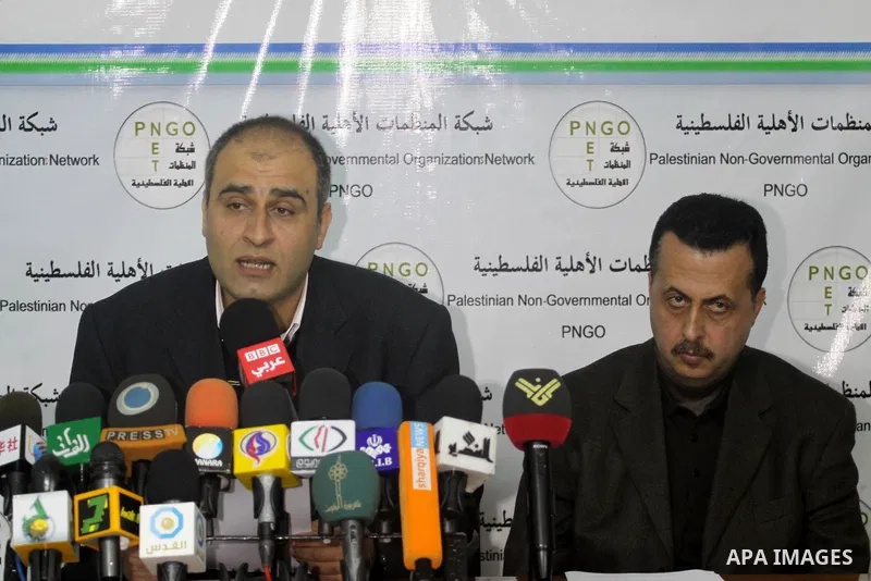 Palestinians from NGOs attend a press conference, in Gaza city on Feb. 21, 2011.. Photo by Mohammed Asad