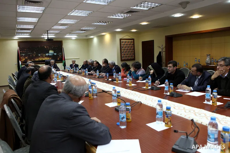 Palestinian prime minister Salam Fayyad during a consultation meeting with civil society institution and Palestinian Universities regarding the formation of a new government in the West Bank City of Ramallah on Feb. 21,...