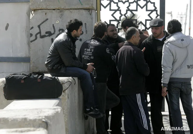 Palestinians arrive to the Gaza Strip through the Rafah border crossing with Egypt, in southern Gaza, on February 22, 2011 after it was opened for passage for people leaving and entering the Palestinian enclave. Photo by...